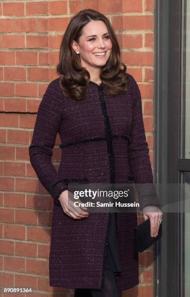 Catherine, Duchess of Cambridge attends the 'Magic Mums' community Christmas party held at Rugby Portobello Trust on December 12, 2017 in London,...