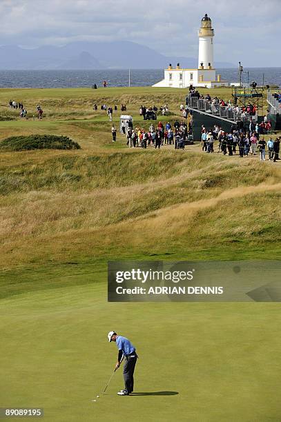 Golfer Zach Johnson putts on the 15th green, on the third day of the 138th British Open Championship at Turnberry Golf Course in south west Scotland,...