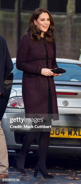 Catherine, Duchess of Cambridge attends the 'Magic Mums' community Christmas party held at Rugby Portobello Trust on December 12, 2017 in London,...