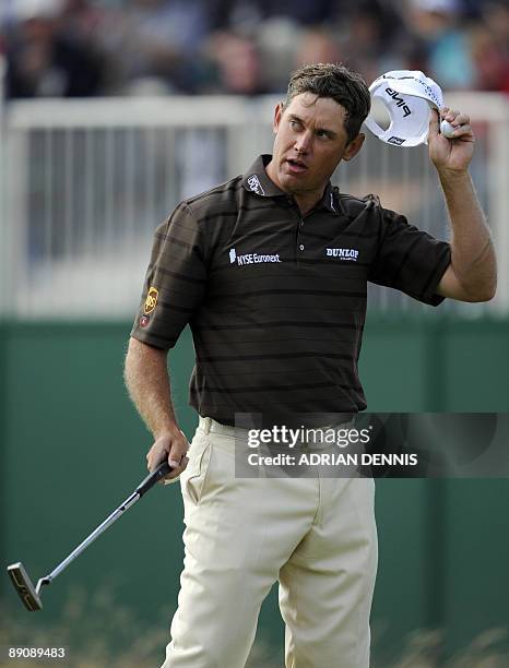 English golfer Lee Westwood leaves the 18th green after finishing his round, on the third day of the 138th British Open Championship at Turnberry...