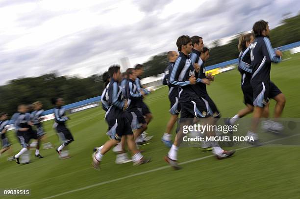 Real Madrid's players run during their second training session on July 18, 2009 at the Carton House Hotel, in Maynooth, 22 km from Dublin. Real...