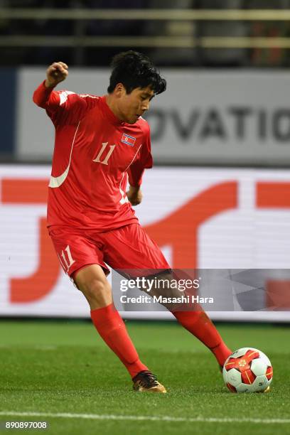 Jong Il Gwan of North Korea in action during the EAFF E-1 Men's Football Championship between North Korea and South Korea at Ajinomoto Stadium on...