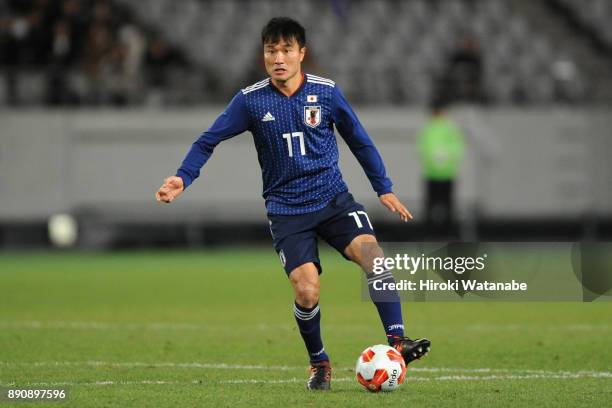 Yasuyuki Konno of Japan in action during the EAFF E-1 Men's Football Championship between Japan and China at Ajinomoto Stadium on December 12, 2017...