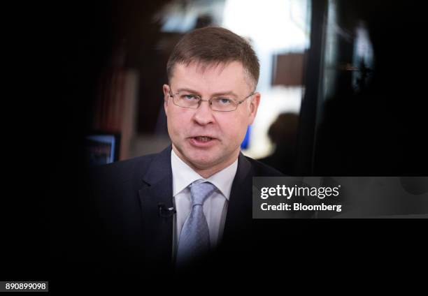 Valdis Dombrovskis, vice president of the European Commission, speaks during a Bloomberg Television interview at the One Planet Summit in Paris,...