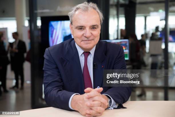 Jean-Louis Chaussade, chief executive officer of Suez SA, poses for a photograph ahead of a Bloomberg Television interview at the One Planet Summit...