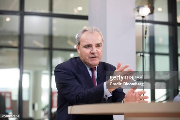 Jean-Louis Chaussade, chief executive officer of Suez SA, gestures while speaking during a Bloomberg Television interview at the One Planet Summit in...