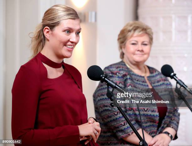 The Executive Director Beatrice Fihn of the International Campaign to Abolish Nuclear Weapons and Norwegian Prime Minister Erna Solberg talk during a...