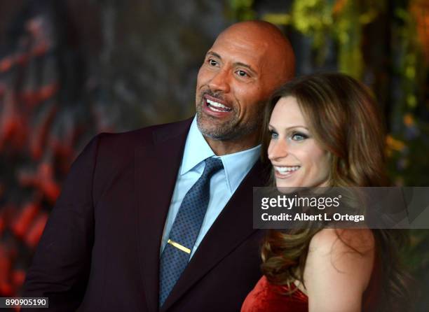 Actor Dwayne "The Rock" Johnson and Lauren Hashian arrive for the Premiere Of Columbia Pictures' "Jumanji: Welcome To The Jungle" held at The TLC...