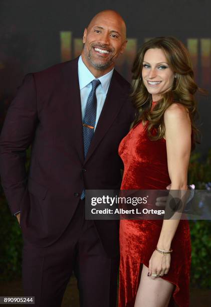 Actor Dwayne "The Rock" Johnson and Lauren Hashian arrive for the Premiere Of Columbia Pictures' "Jumanji: Welcome To The Jungle" held at The TLC...