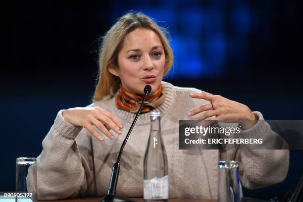 French actress Marion Cotillard speaks during a panel conference at the One Planet Summit on December 12 at La Seine Musicale venue on l'ile Seguin...