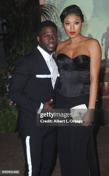 Actor Kevin Hart and Eniko Parrish arrive for the Premiere Of Columbia Pictures' "Jumanji: Welcome To The Jungle" held at The TLC Chinese Theater on...