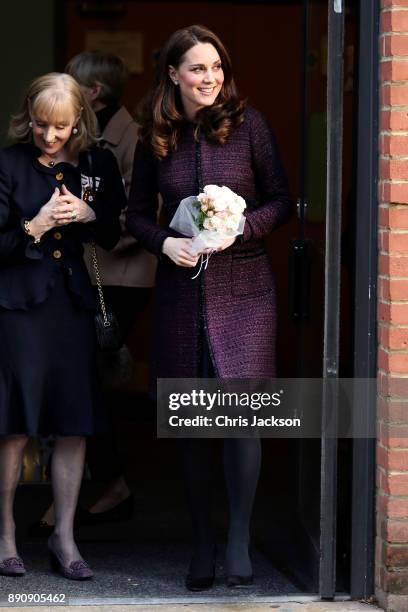 Catherine, Duchess of Cambridge departs from the 'Magic Mums' community Christmas party held at Rugby Portobello Trust on December 12, 2017 in...