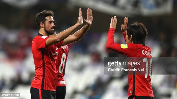 Yosuke Kashiwagi of Urawa Reds celebrates scoring his team's second goal with Mauricio Antonio during the FIFA Club World Cup UAE 2017 fifth place...