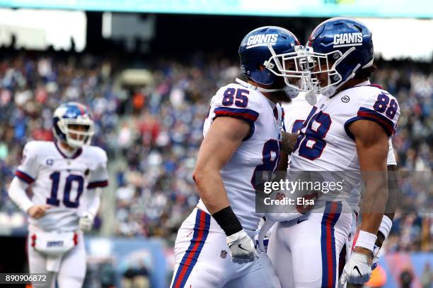 Rhett Ellison of the New York Giants celebrates with Evan Engram after scoring a touchdown against the Dallas Cowboys during second quarter in the...