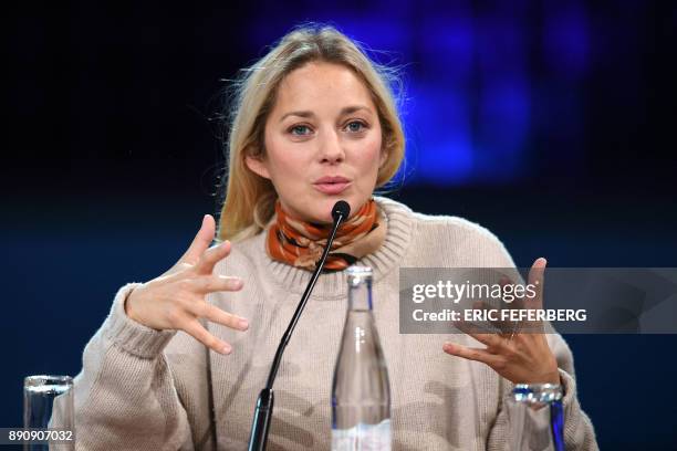 French actress Marion Cotillard speaks during a panel conference at the One Planet Summit on December 12 at La Seine Musicale venue on l'ile Seguin...