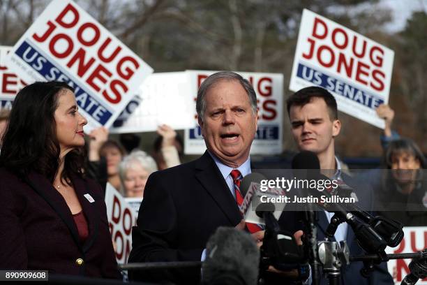 Democratic senatorial candidate Doug Jones speaks to reporters after voting at Brookwood Baptist Church on December 12, 2017 in Mountain Brook,...