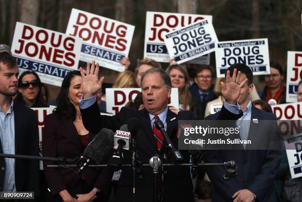 Democratic senatorial candidate Doug Jones speaks to reporters after voting at Brookwood Baptist Church on December 12, 2017 in Mountain Brook,...