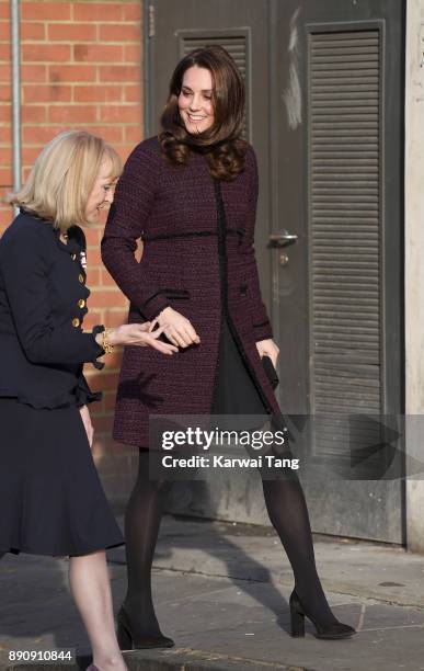 Catherine, Duchess of Cambridge, attends the 'Magic Mums' community Christmas party held at Rugby Portobello Trust on December 12, 2017 in London,...