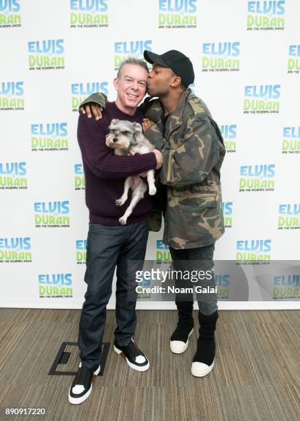 Elvis Duran and his dog Max Duran pose for a photo with Todrick Hall at "The Elvis Duran Z100 Morning Show" at Z100 Studio on December 12, 2017 in...