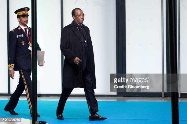 Idriss Deby, president of Chad, right, arrives at the One Planet Summit in Paris, France, on Tuesday, Dec. 12, 2017. French President Emmanuel Macron...
