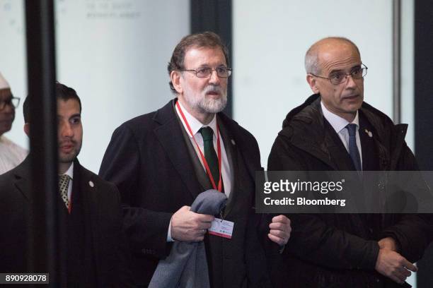 Mariano Rajoy, Spain's prime minister, center, arrives at the One Planet Summit in Paris, France, on Tuesday, Dec. 12, 2017. French President...