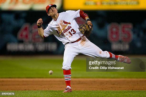 Brendan Ryan of the St. Louis Cardinals misplays a ground ball against the Arizona Diamondbacks on July 18, 2009 at Busch Stadium in St. Louis,...