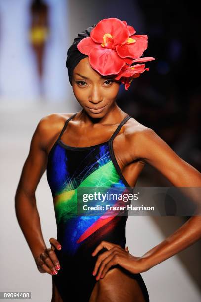 Model walks the runway at the Extra Life Lycra 2010 fashion show during Mercedes-Benz Fashion Week Swim at the Cabana Grande at The Raleigh on July...