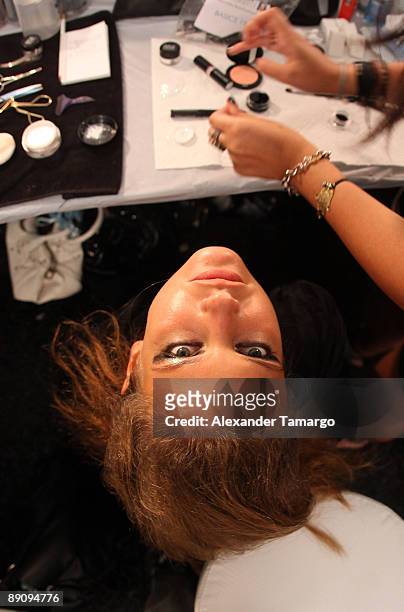 Model is seen backstage before the Ed Hardy fashion show during Mercedes Benz Fashion Week Swim at Cabana Grande on July 18, 2009 in Miami, Florida.
