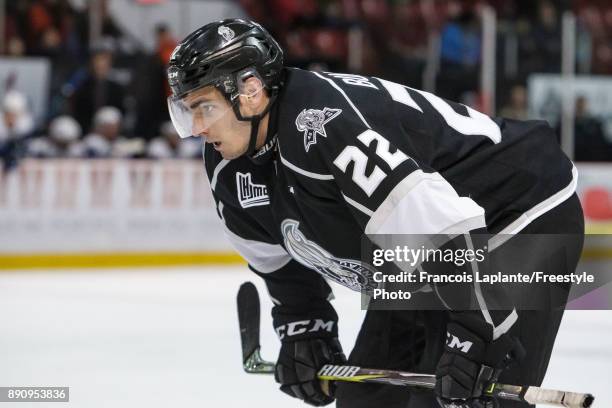 Shawn Boudrias of the Gatineau Olympiques looks on during a faceoff against the Saint John Sea Dogs on December 1, 2017 at Robert Guertin Arena in...