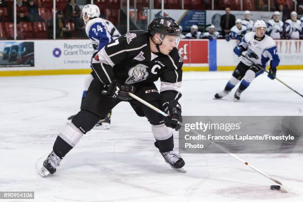 Alex Breton of the Gatineau Olympiques skates with the puck against the Saint John Sea Dogs on December 1, 2017 at Robert Guertin Arena in Gatineau,...