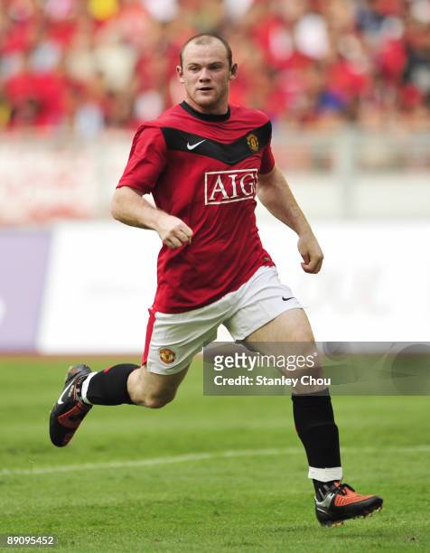 Wayne Rooney of Manchester United runs for the ball during the pre-season friendly match between Manchester United and Malaysia XI at the Bukit Jalil...