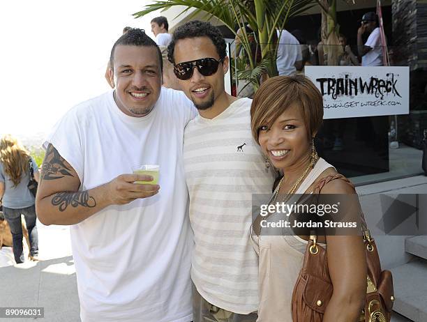 Big Billy Clark, Quudus and Elise Neal attend Big Billy Clark's Annual Debauchery Birthday Pool Party at a private residence on July 18, 2009 in Los...