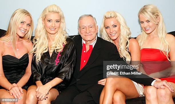 Melissa Taylor, television personality and model Holly Madison, Playboy founder Hugh Hefner, Crystal Harris and Anna Berglund appear in Madison's...