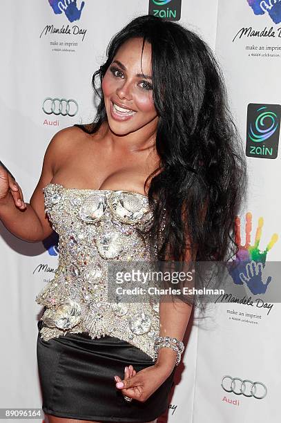 Singer Lil' Kim attends the Mandela Day: A 46664 Celebration Concert at Radio City Music Hall on July 18, 2009 in New York City.