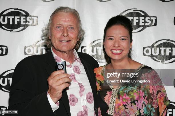 Actors Rutger Hauer and Francoise Yip attend the world premiere of "Motherland" at Outfest 2009 at the Directors Guild of America on July 18, 2009 in...