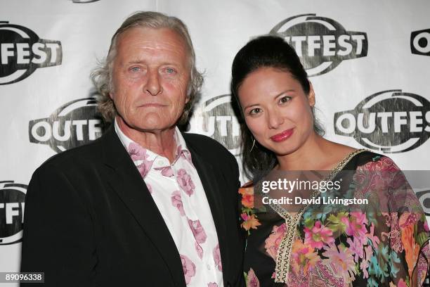 Actors Rutger Hauer and Francoise Yip attend the world premiere of "Motherland" at Outfest 2009 at the Directors Guild of America on July 18, 2009 in...