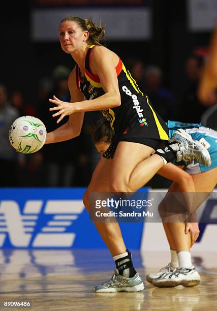 Casey Williams of the Magic looks to pass the ball after taking an intercept during the ANZ Championships Preliminary Final match between the Waikato...