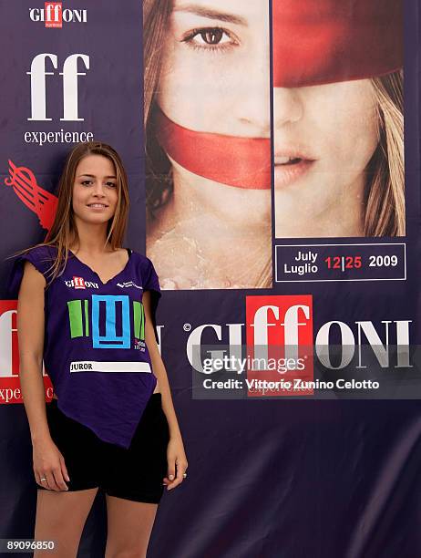 Giada Brucia, Giffoni Experience testimonial, poses in front of her portrait during a photocall on July 19, 2009 in Giffoni Valle Piana, near...