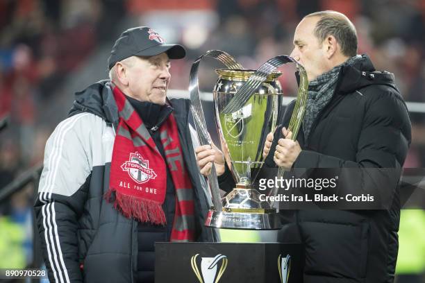 Don Garber Commissioner of Major League Soccer and Larry Tanenbaum Chairman of Maple Leaf Sports & Entertainment with the MLS Championship Cup after...
