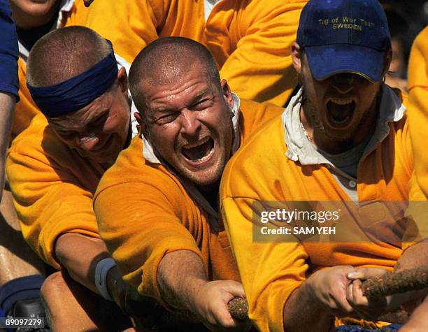 Sweden's tug-of-war team duel with Great Britain during the men's 640-kilogram event at the World Games in Kaohsiung on July 19, 2009. The World...