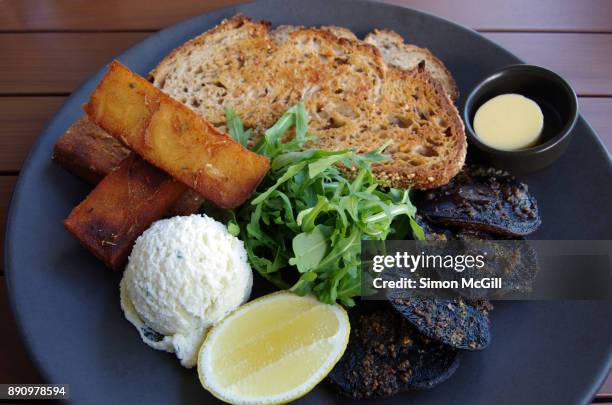 roasted field mushrooms with basil pesto, hash browns, herb ricotta, arugula, seeded rye bread, fresh lemon and butter - herb butter stock pictures, royalty-free photos & images