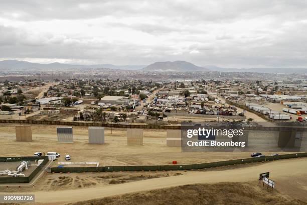 Prototype U.S.-Mexico border walls stand in this aerial photograph taken over San Diego, California, U.S., on Monday, Oct. 30, 2017. President Donald...