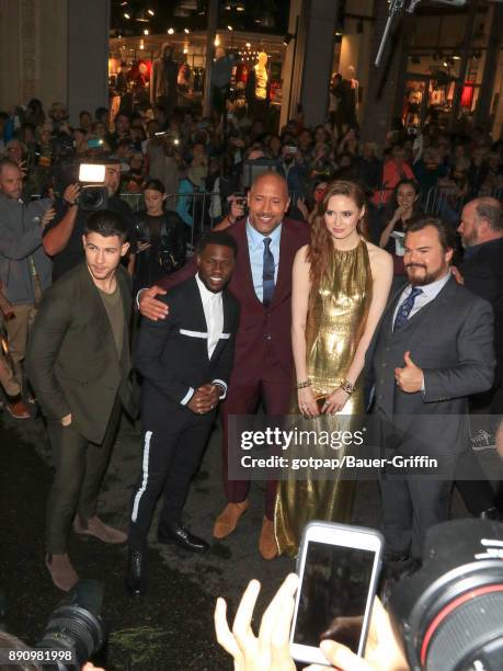 Nick Jonas, Kevin Hart, Dwayne Johnson, Karen Gillan and Jack Black are seen attending the premiere of Columbia Pictures' 'Jumanji: Welcome To The...