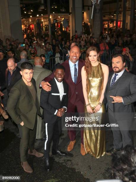 Nick Jonas, Kevin Hart, Dwayne Johnson, Karen Gillan and Jack Black are seen attending the premiere of Columbia Pictures' 'Jumanji: Welcome To The...