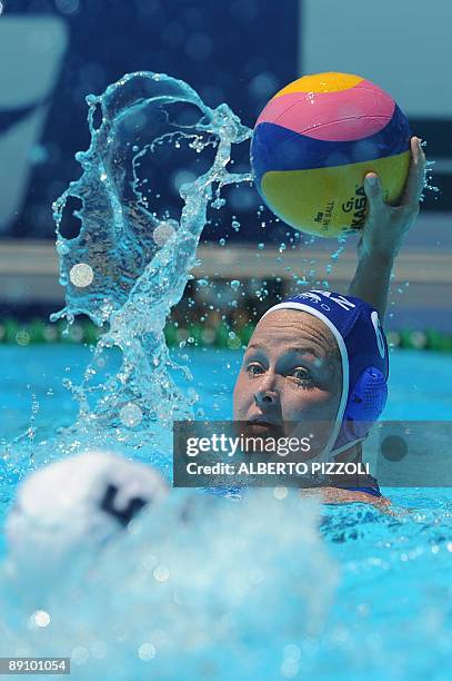 Kazakhstan Anna Zubkova vies with US Lauren Wenger during their 1st round water-polo game on July 19, 2009 at the FINA World Swimming Championships...