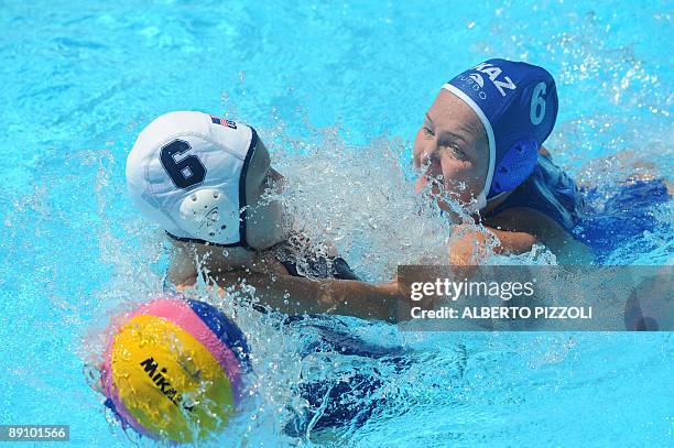 Kazakhstan Anna Zubkova vies with US Tanya Gandi during their 1st round water-polo game on July 19, 2009 at the FINA World Swimming Championships in...