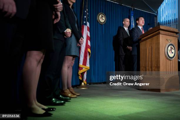 William Sweeney, assistant director-in-charge of the New York office of the Federal Bureau of Investigation , looks on as Joon Kim, acting U.S....