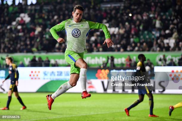 Paul Verhaegh of VfL Wolfsburg celebrates after scoring from the penalty spot to make it 1-0 during the Bundesliga match between VfL Wolfsburg and RB...