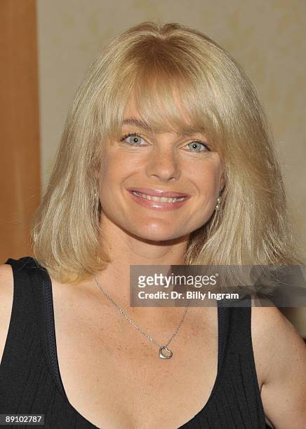 Actress Erika Eleniak attends The Hollywood Collectors and Celebrities Show at the Burbank Airport Marriott on July 18, 2009 in Burbank, California.