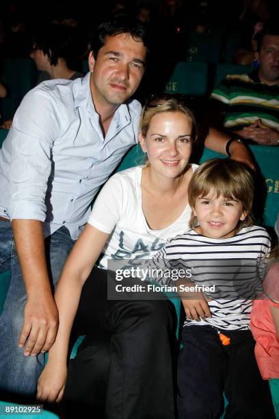 Andreas Elsholz, wife Denise Zich and son Julius attend the Berlin premiere of Mullewapp at UCI Kinowelt Colloseum on July 19, 2009 in Berlin,...